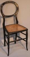 A 19thC ebonised balloon back chair