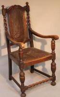 A 19thC oak barley twist armchair.