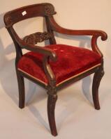 A William IV scroll armed dining chair.