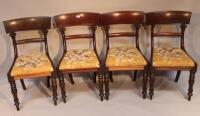 A set of four William IV mahogany dining chairs.