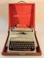 An Olivetti Studio 44 typewriter in case.