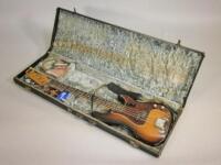 A 1960s Fender electric Precision Bass guitar