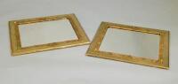 A pair of late 19th/early 20thC green painted and parcel gilt rectangular wall mirrors
