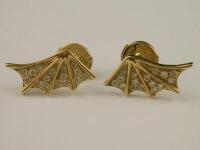 A pair of Astley Clark wing earrings