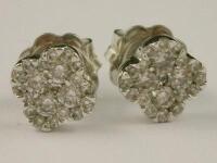 A pair of 18ct gold floral cluster earrings