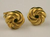 A pair of knot earrings