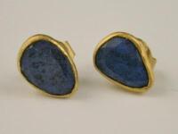 A pair of single stone set earrings