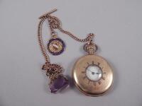 A pocket watch and chain