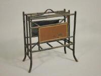 A Victorian ebonised bamboo two division music stand or Canterbury