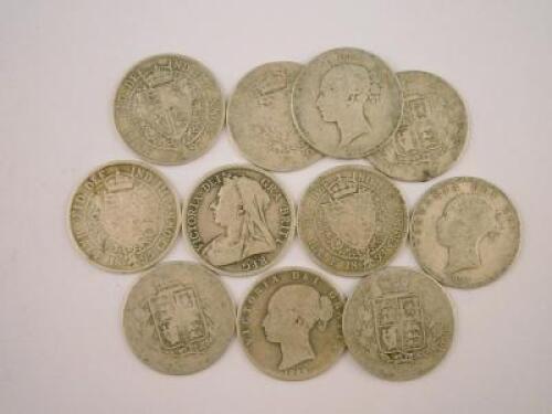 Eleven Victorian silver half crowns