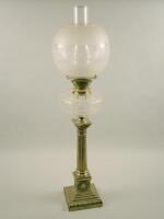 A late Victorian silver plated and cut glass oil lamp