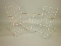 A pair of 1950's Ernest Race painted steel framed rocking chairs