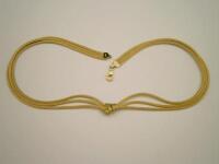 An Astley Clark 18ct gold three row necklace