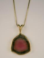 An agate pendant and chain