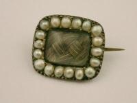 A small Victorian memorial brooch