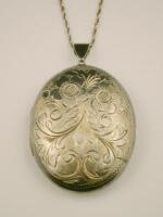 A silver locket and chain