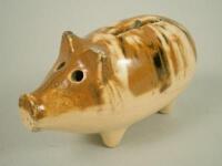 A late 19th/early 20thC slipware pig