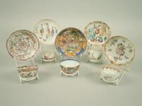 A collection of five Chinese porcelain tea bowls and saucers