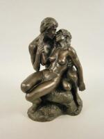 A Heredities bronzed resin figure