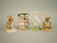 Four Beatrix Potter figures