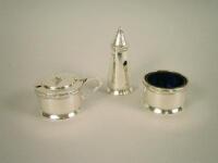 A silver Art Deco three piece cruet