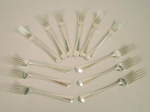 An associated set of twelve Old English pattern dessert forks