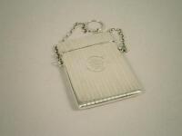 A George V engine turned silver card case with chain