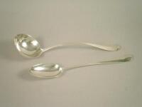 A Victorian Old English pattern and rat tail silver ladle and matching serving spoon