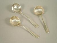 Two similar 18thC small ladles with shell shaped bowls