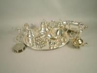 A quantity of silver plated items to include a two handled oval tray