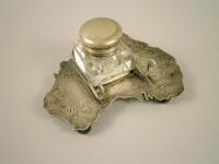 An unusual novelty silver plated inkwell