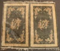 Two similar Chinese silk type carpets