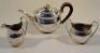 A George V three piece silver tea set - 2