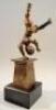 A contemporary patinated cast brass figure of a boy doing a handstand - 2