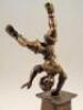 A contemporary patinated cast brass figure of a boy doing a handstand - 3