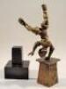 A contemporary patinated cast brass figure of a boy doing a handstand - 4