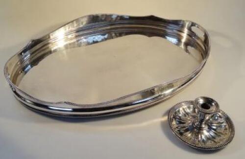 A silver plated oval two-handled gallery tray