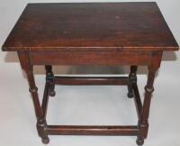 An 18thC elm and oak hall table