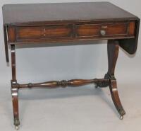 A Georgian style mahogany sofa table.