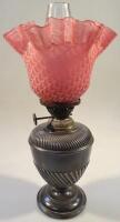 A Victorian oil lamp