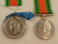 A 1939-45 British War Medal and a Queen Victoria Jubilee commemorative medallion