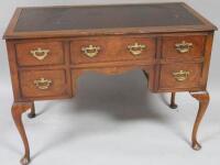 A 19thC walnut desk