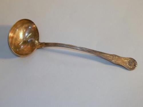 A George III crested silver Kings pattern soup ladle