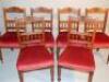 A set of six Edwardian oak dining chairs