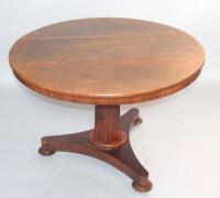 A Victorian mahogany circular tip top breakfast table