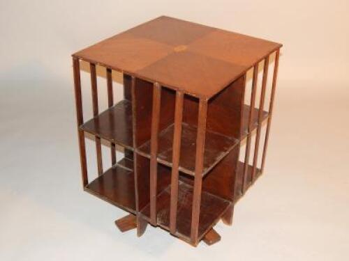 An Edwardian mahogany revolving bookcase