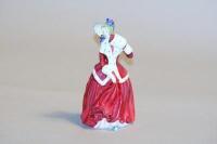 A Royal Doulton figure of a lady 'Christmas Morn'