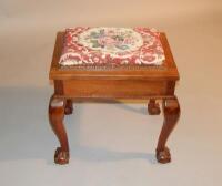 A Victorian mahogany piano stool