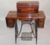 An Edwardian sewing machine table