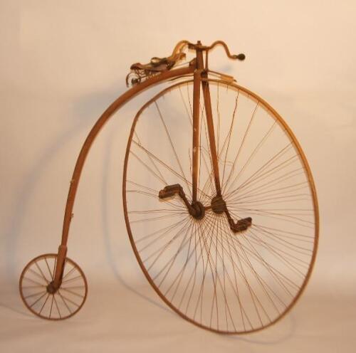 A Victorian penny farthing bicycle.